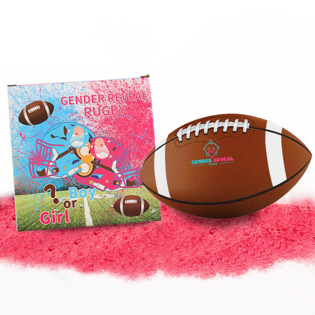 Sports Gender Reveal NFL Ball displayed with decorative packaging showing cartoon characters on a blue and pink background, alongside traditional brown football with white stripes and gender reveal logo, set against pink powder effect