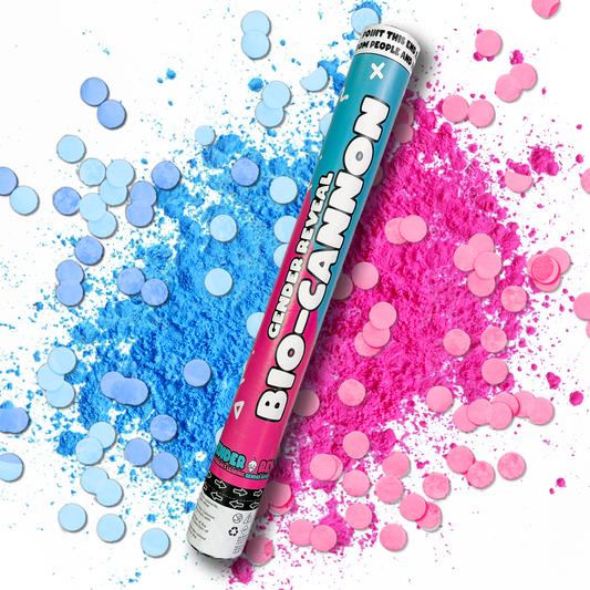 Gender Reveal Confetti & Powder Cannon XL 50cm shown diagonally across vibrant pink and blue powder explosions with matching confetti dots, demonstrating the dramatic reveal effect against white background