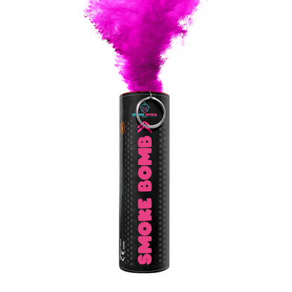 Extreme Gender Reveal Smoke Bomb emitting vibrant pink smoke from a black cylindrical canister with pink lettering, showing product in action against white background, demonstrating smoke density and color intensity for gender reveal celebrations.