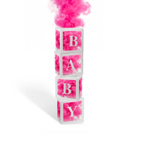 DIY Gender Reveal Smoke Box Trend with pink smoke coming out of stacked BABY blocks for gender reveal celebration