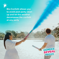Gender Reveal Confetti Cannon XL BIO Bundle shown launching blue biodegradable confetti outdoors by a couple in white outfits