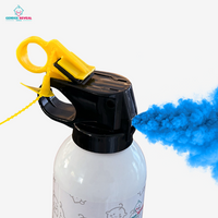 Mini gender reveal powder extinguisher releasing vibrant blue powder for baby gender celebration party blast