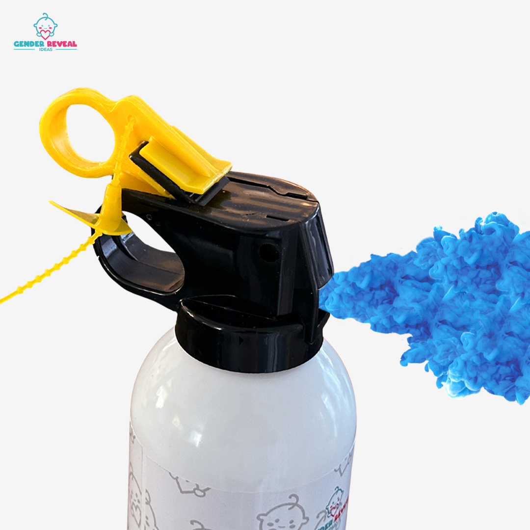 Gender Reveal Powder Extinguisher Mini Blaster with yellow trigger mechanism and black nozzle spraying vibrant blue powder, displayed against white background, featuring white canister body with decorative patterns