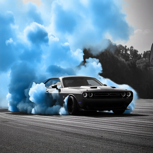 BURNOUT Smoke EXTREME Gender Reveal Burnout Powder showcased with black Dodge Challenger performing dramatic tire burnout against vibrant blue sky, creating intense smoke clouds perfect for gender reveal celebrations