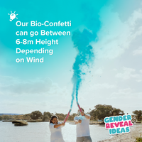Gender Reveal Powder Cannon BIO XL Bundle creates bright blue smoke plume reaching skyward at outdoor celebration by water
