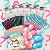 Gender-Geddon Australia's Largest Gender Reveal Bundle featuring white smoke cannons, handheld smoke flares in pink and blue, decorative balloons, and OH BABY gold letter balloons arranged in a fan pattern against a background with pink and blue question marks