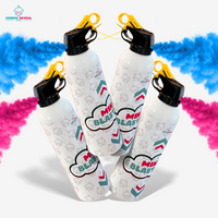 Four gender reveal powder extinguishers releasing vibrant blue and pink powder for party celebration events