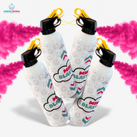 Four mini gender reveal powder extinguishers releasing bright pink powder for party celebration bundle display