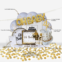 FREE Baby Shower Party Box Set featuring 71 pieces including gold OH BABY balloon banner, white and gold party supplies, biodegradable plates, prediction cards, cake topper, and confetti displayed against a white background with detailed product labeling for easy setup
