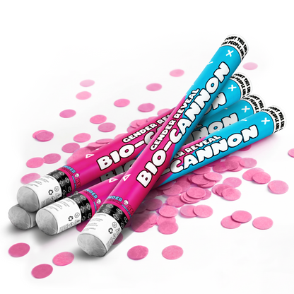 Four pink and blue gender reveal XL bio confetti cannons with scattered pink paper confetti on white background