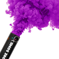 Gender reveal smoke bombs in pink and blue colors