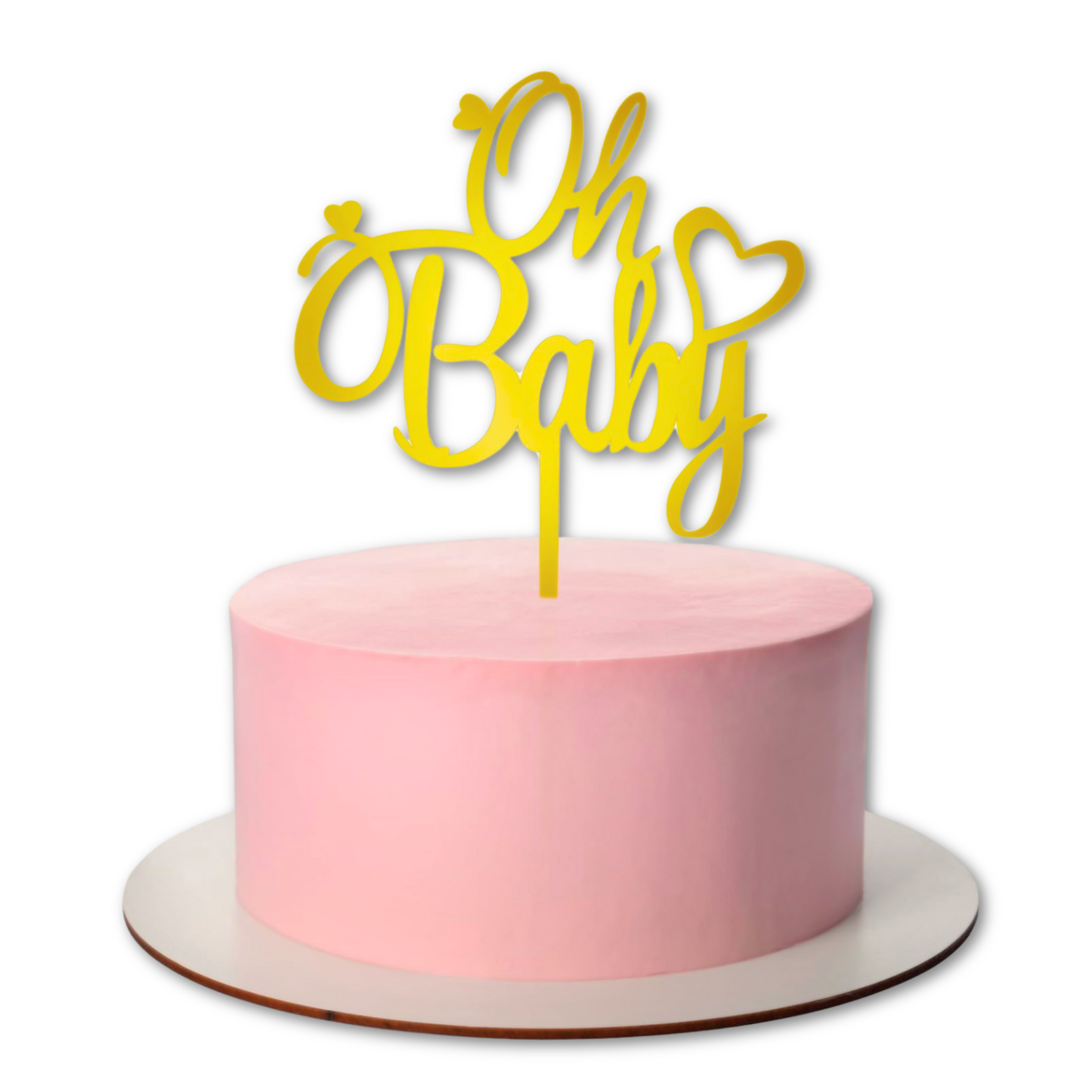 Elegant gold "Oh Baby" acrylic cake topper featuring cursive lettering and heart detail, displayed on a smooth pink frosted round cake. Perfect for baby showers and gender reveals.